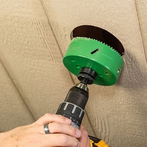 RainEscape Soffit Hole Saw In Use